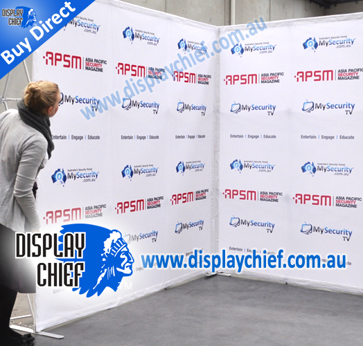 Person looking around at the corner of the free standing display sign with printed graphics for Asia Pacific Security Magazine display exhibition