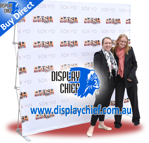 Pop up display Ladies on red carpet having photo taken infront of portable step repeat sign banner backdrop for bash entertainment sokyo Sydney
